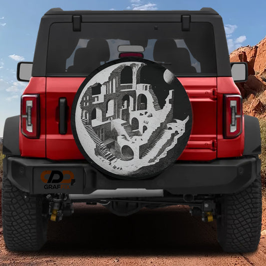 a red Jeep Wrangler with a large, round spare tire on the back, set against a desert landscape with mountains in the background.