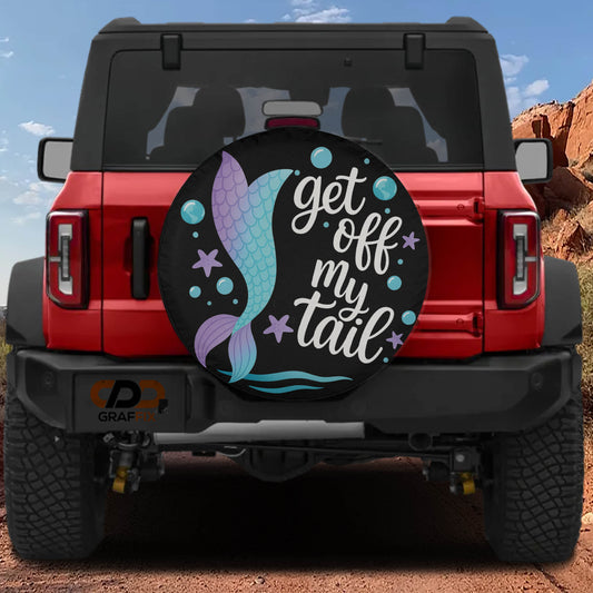 A red Jeep Wrangler with a black and purple mermaid tail decal on the rear window.