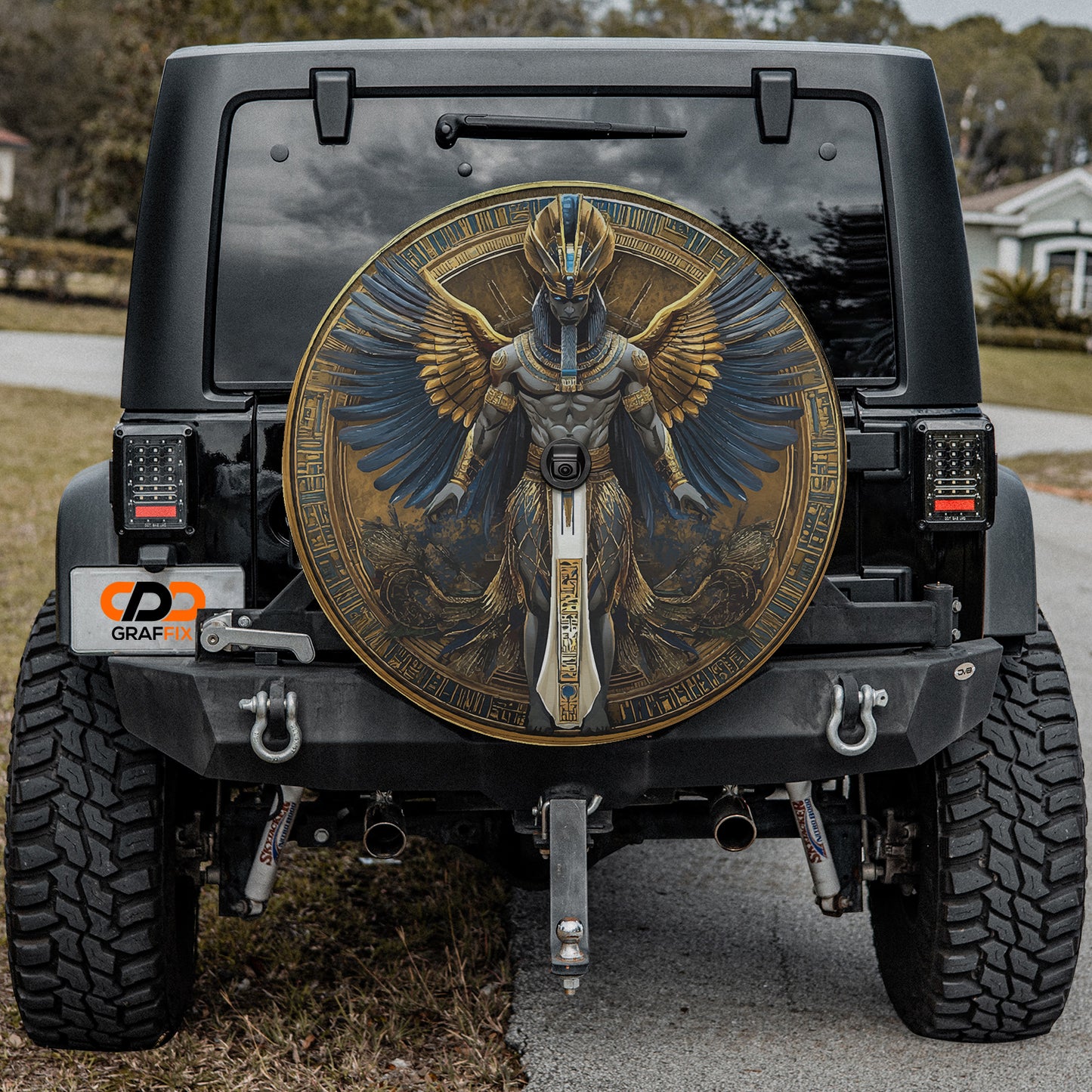 a black jeep with an egyptian god painted on it