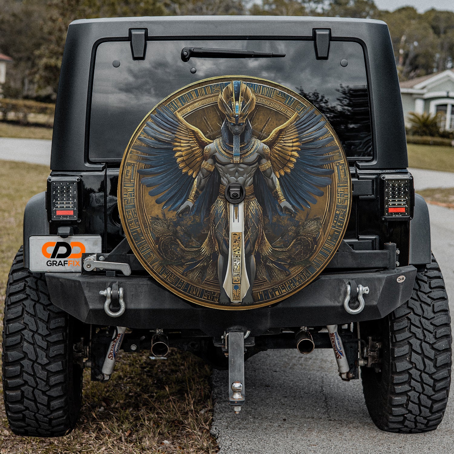 a black jeep with an egyptian god painted on it