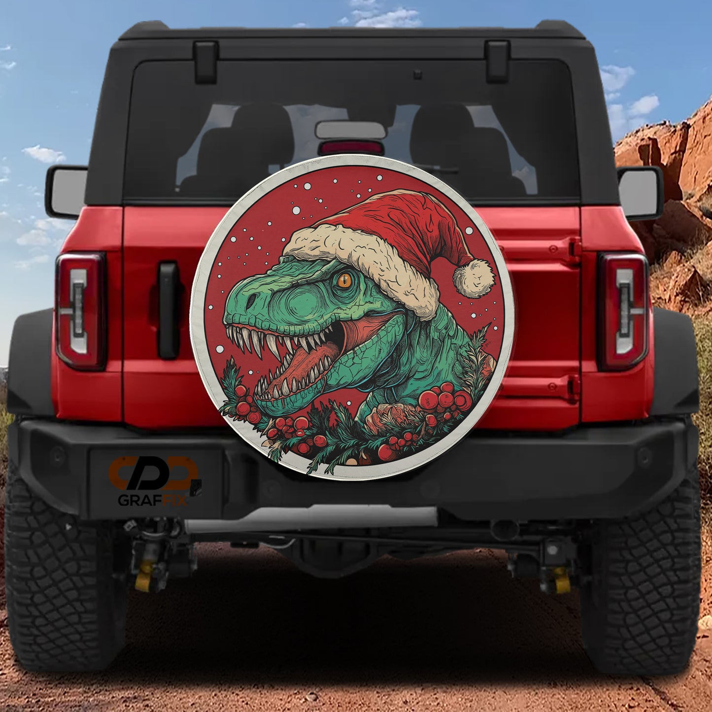 A red Jeep Wrangler with a large circular decal of a dinosaur wearing a Santa hat on the rear window.