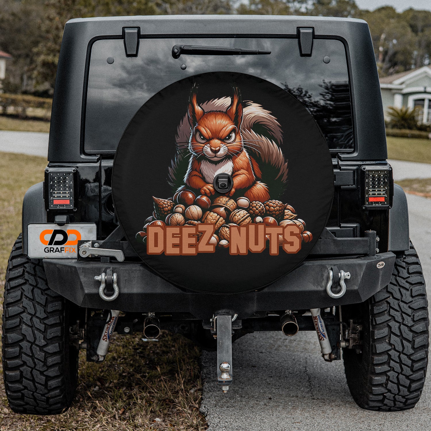 a black jeep with a picture of a squirrel on it