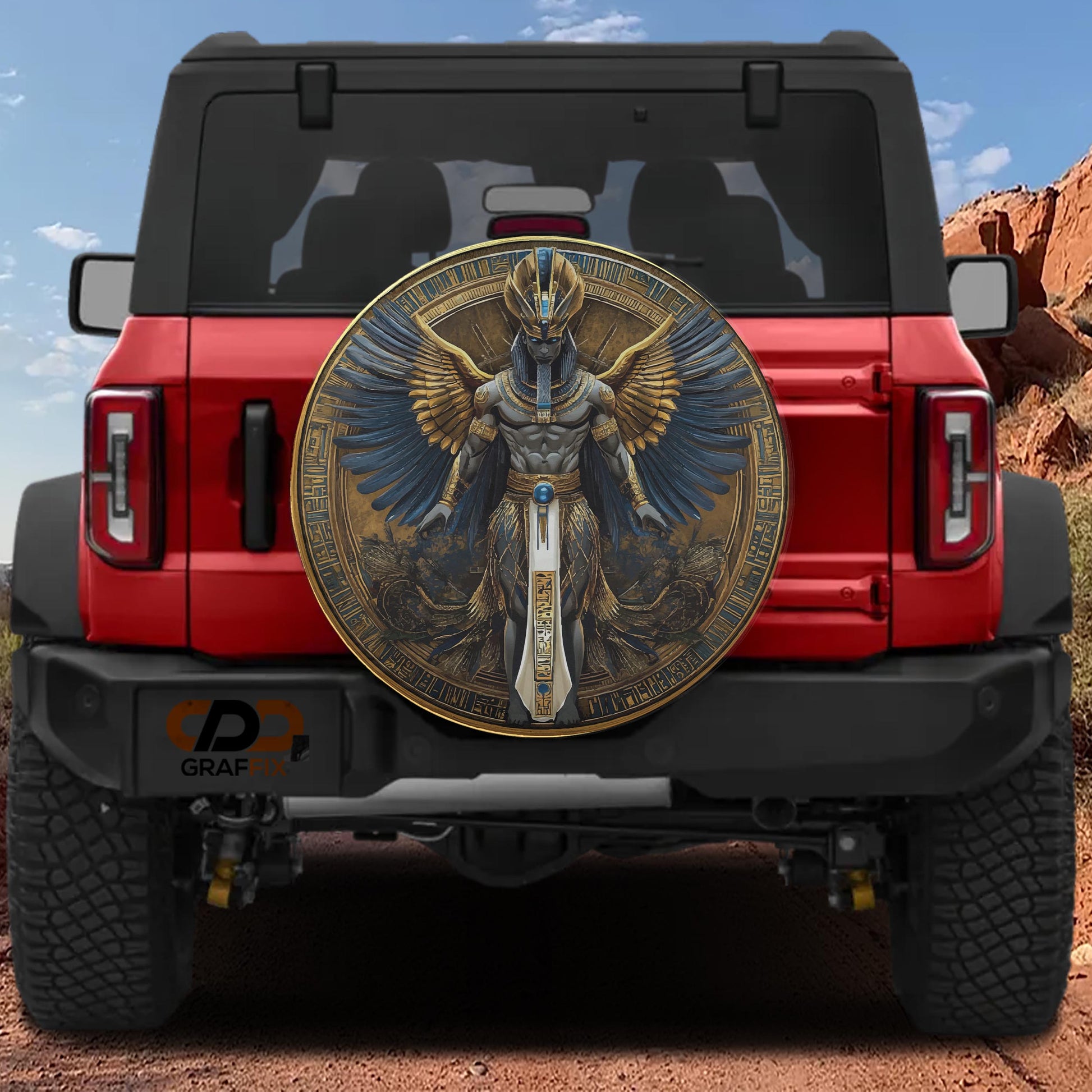 a red Jeep Wrangler with a large, ornate, and intricate circular decal on the rear window.