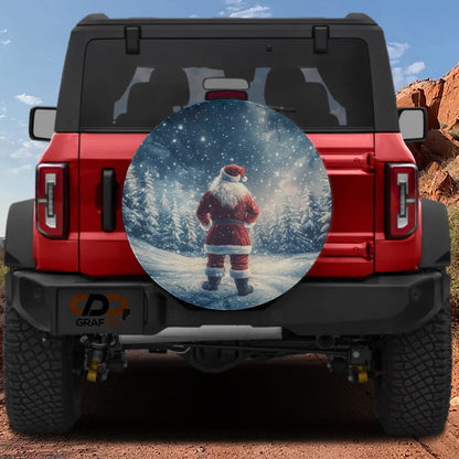 a red Jeep Wrangler with a large round decal of Santa Claus in the snow on the rear window.