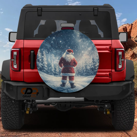 a red Jeep Wrangler with a large round decal of Santa Claus in the snow on the rear window.