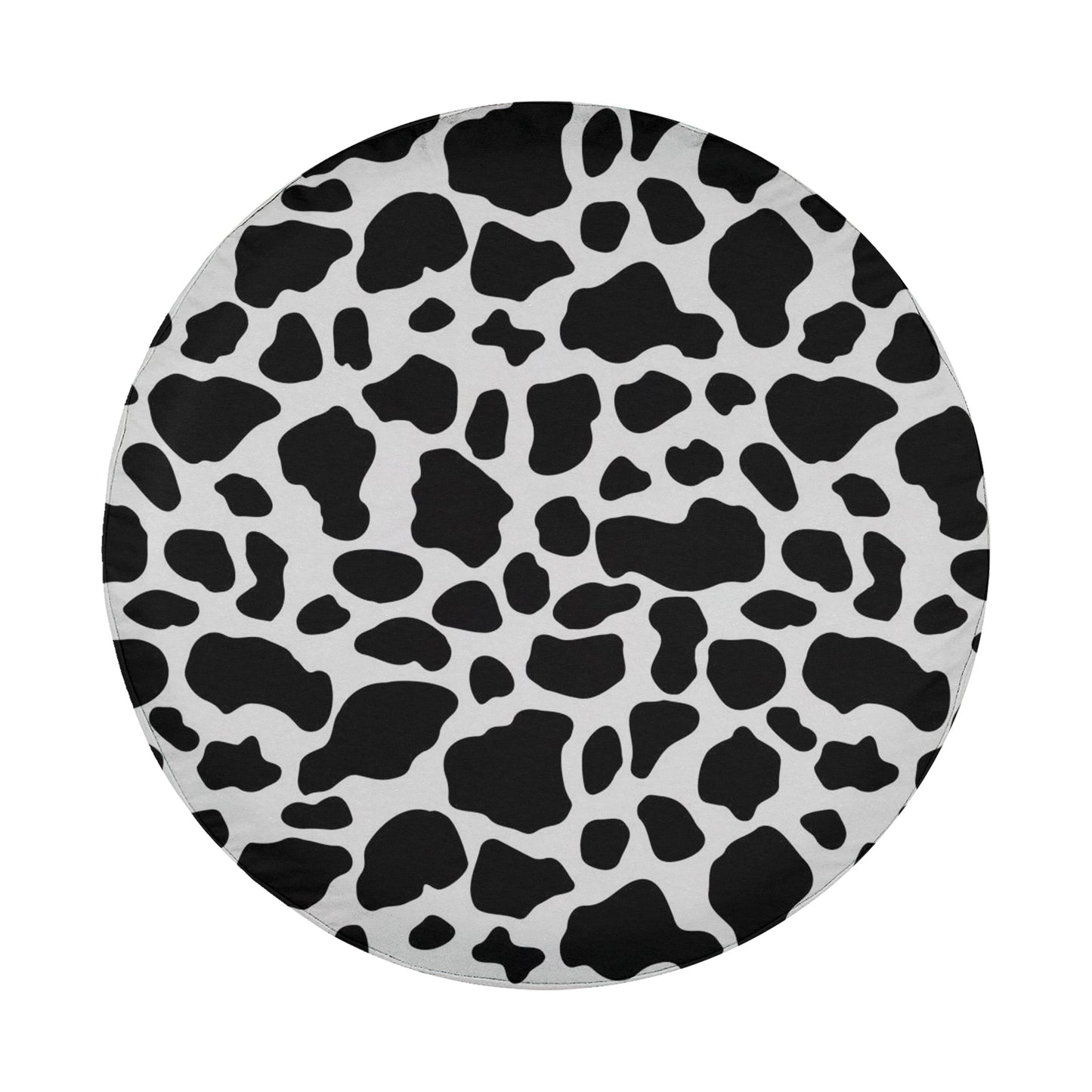 a circular pattern of black and white cow spots.