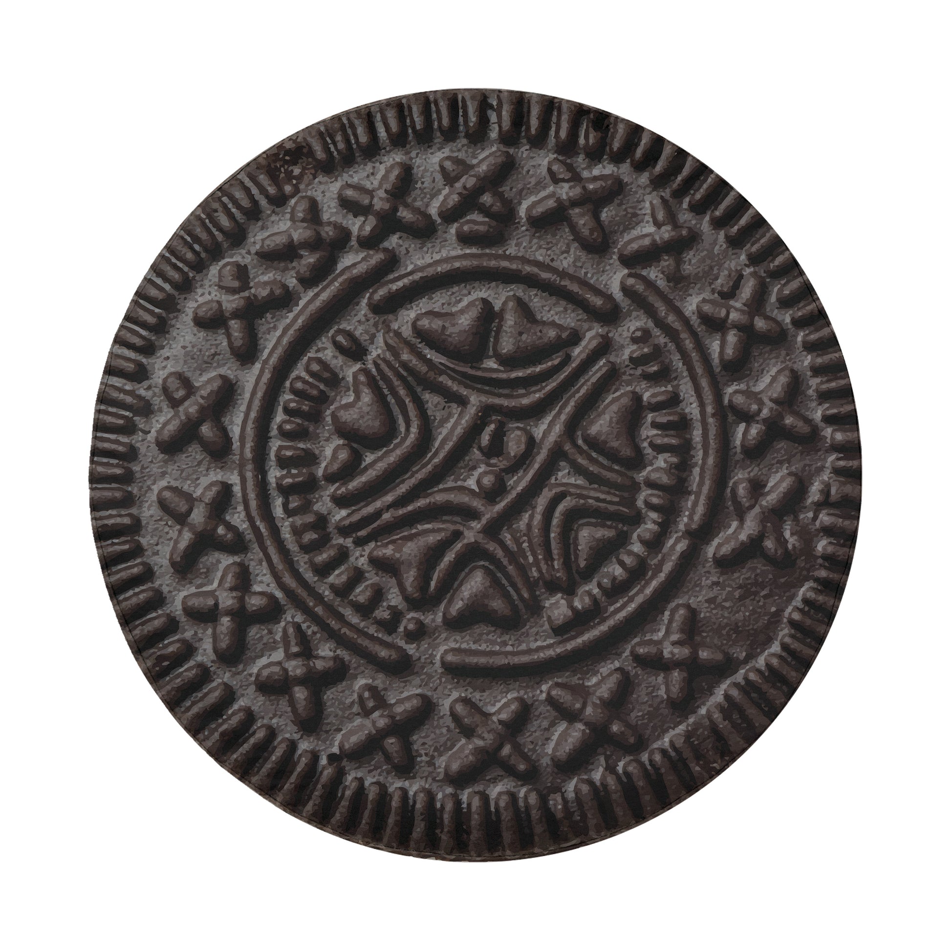 a close-up view of a dark brown, circular cookie or biscuit with a decorative pattern around the edge.