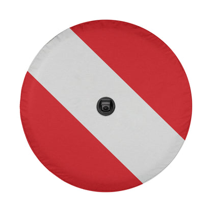 a red and white wheel cover with a black camera lens in the center.