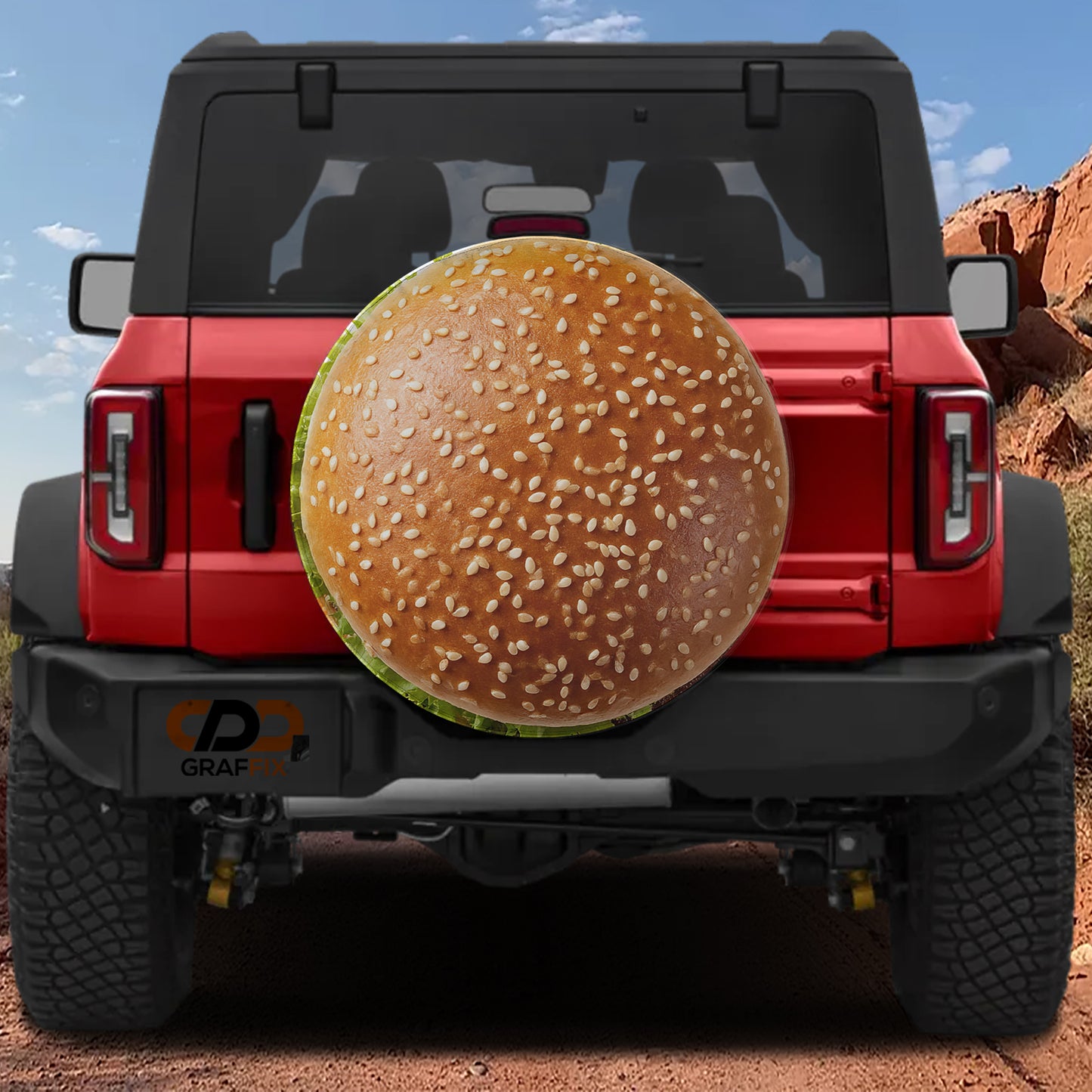a red Jeep Wrangler with a large hamburger bun attached to the rear bumper.