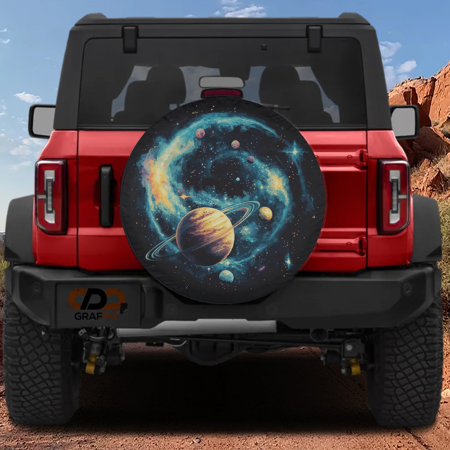 a red Jeep Wrangler with a large planet-themed spare tire cover attached to the rear of the vehicle.