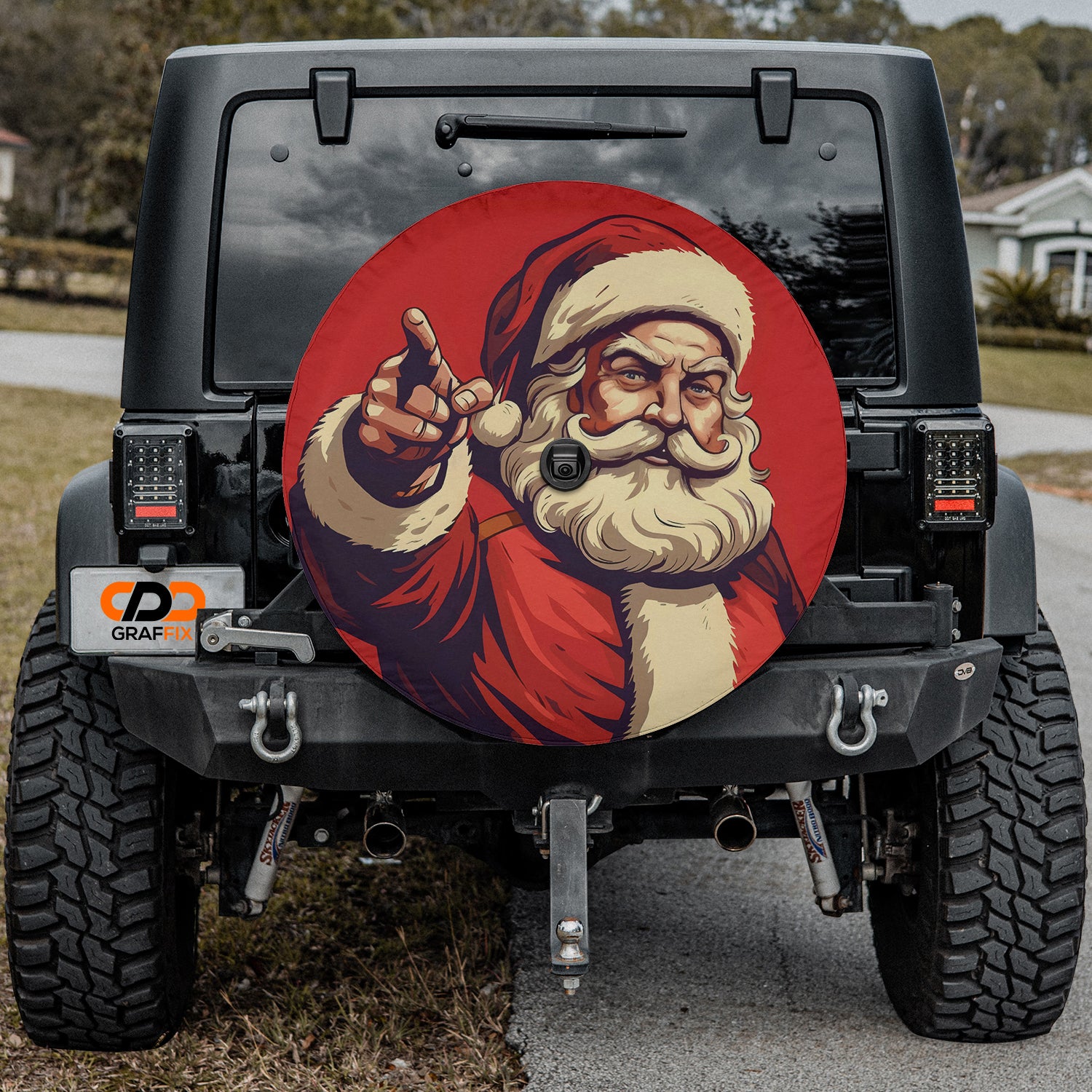 a santa clause painted on the back of a jeep