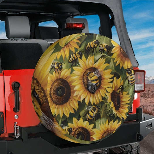 a tire cover with sunflowers and bees on it