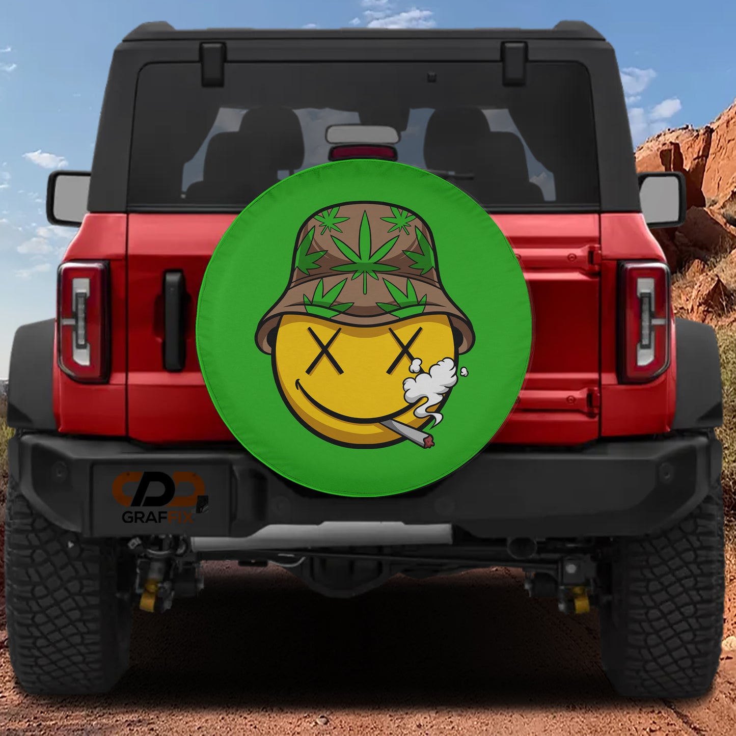 A red Jeep Wrangler with a green wheel cover featuring a cartoon smiley face and a cigarette.