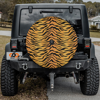a tiger print tire cover on the back of a jeep