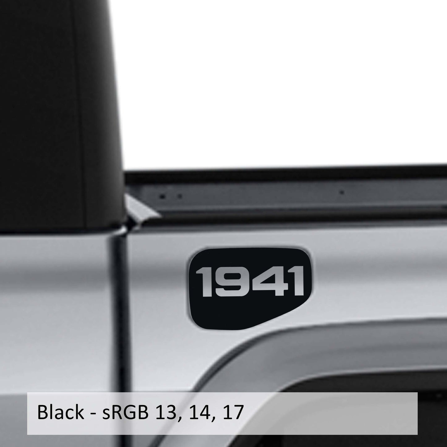 May include: A black truck bed with a black 1941 decal on the side. The truck bed is silver and the decal is in a rounded rectangle shape.