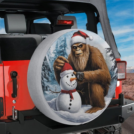 Bigfoot Building a Snowman Spare Tire Cover With Backup Camera Hole Option